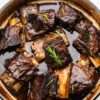 Braised beef short ribs in a rich red wine sauce.