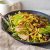 A vibrant bowl of Southwest Avocado Chicken Salad with corn, black beans, and crispy tortilla strips” A vibrant bowl of Southwest Avocado Chicken Salad with corn, black beans, and crispy tortilla strips