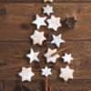 Cinnamon Sugar Snowflake Cookies arranged on a holiday platter