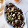 Cranberry Orange Glazed Brussels Sprouts in a serving dish