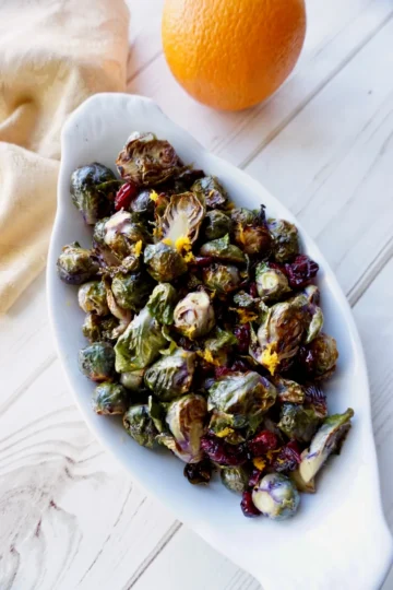 Cranberry Orange Glazed Brussels Sprouts in a serving dish