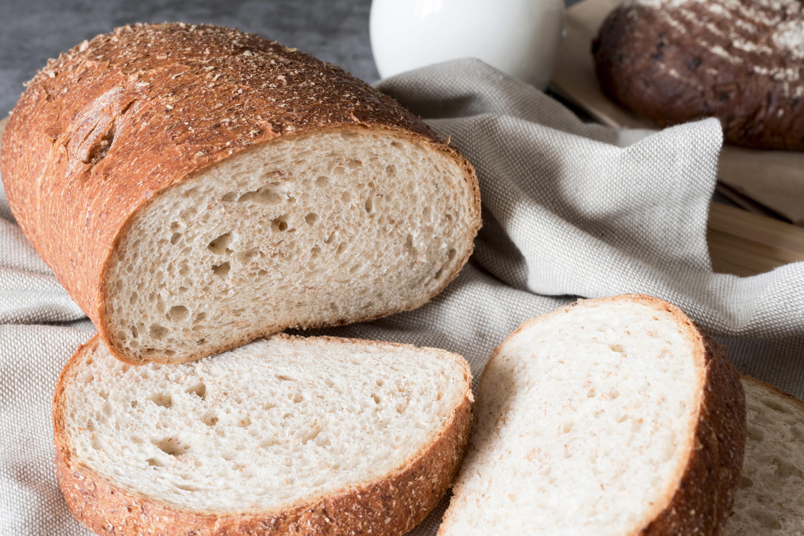 Sliced sourdough bread on a cloth napkin