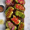 Vegan Avocado Toast with a savory twist, topped with plant-based extras.