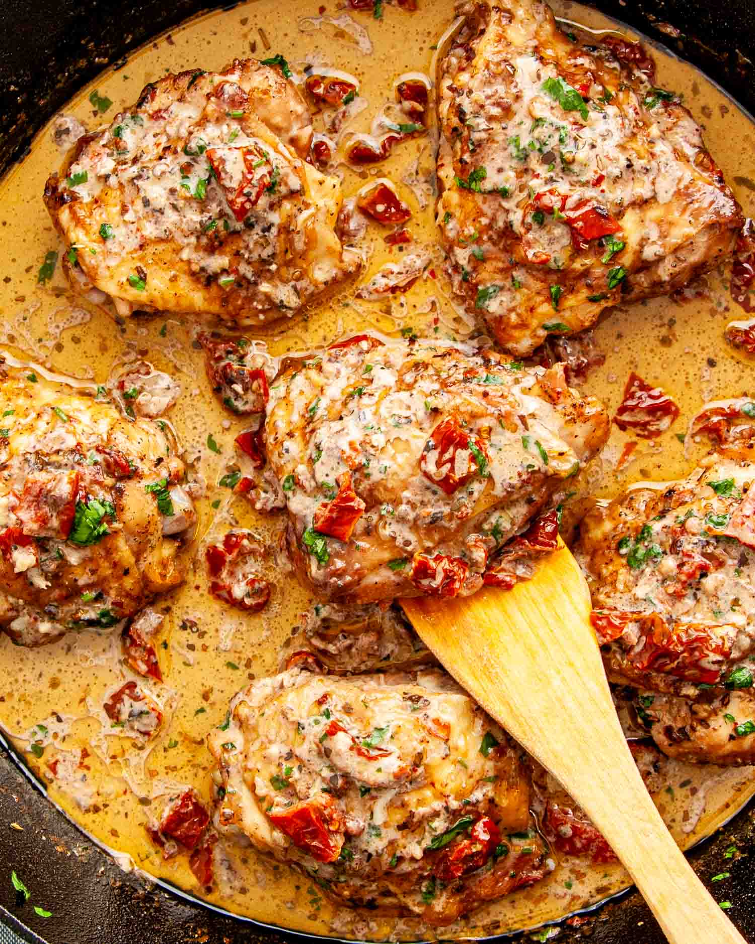 Marry Me Chicken recipe featuring juicy cutlets in a creamy sundried tomato sauce.